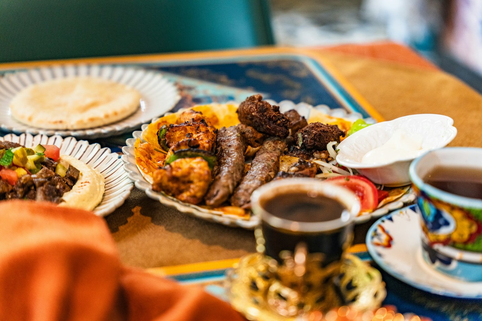 Generous mixed grill platter with rice and mezze